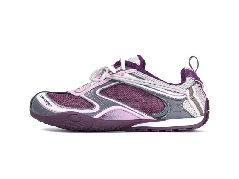 Purple and pink sneaker with mesh fabric and rubber sole, featuring decorative stitching.