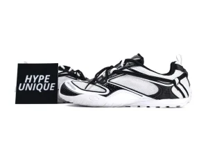 Black and white mesh sneakers with rubber sole, featuring side graphics.