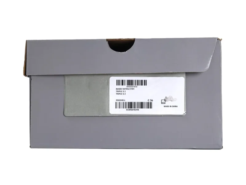 Gray cardboard shoe box with a white label displaying product details.