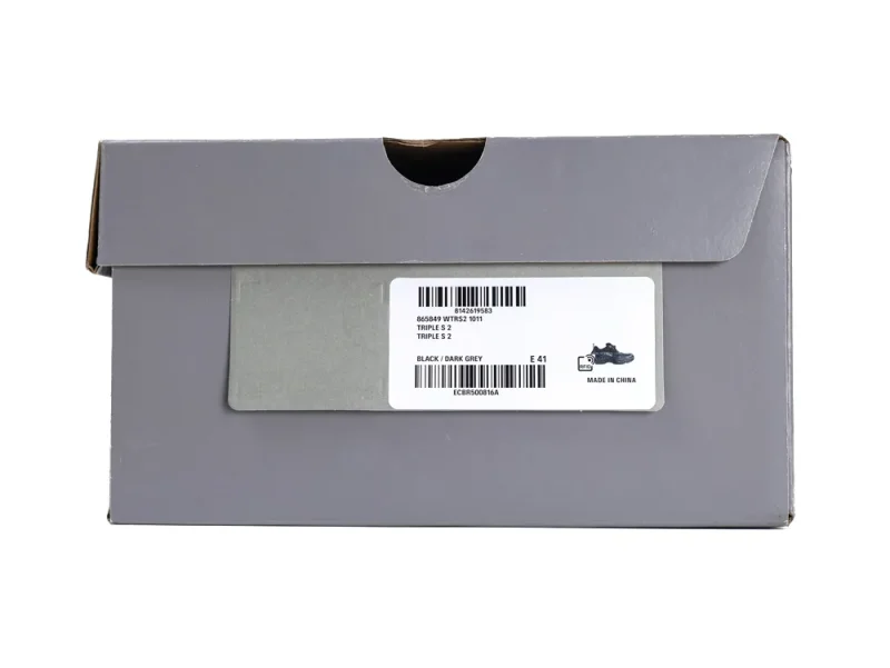 Gray cardboard shoe box with label featuring black and dark grey details.