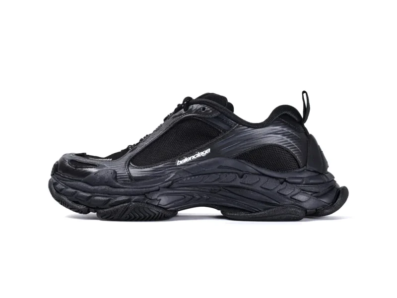 Black sneaker with mesh and leather materials, featuring a thick, textured sole.