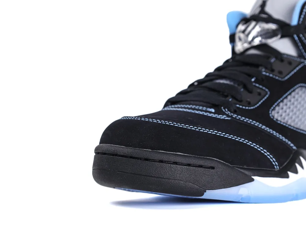 Black suede sneaker with blue stitching and mesh accents, featuring a rubber sole.