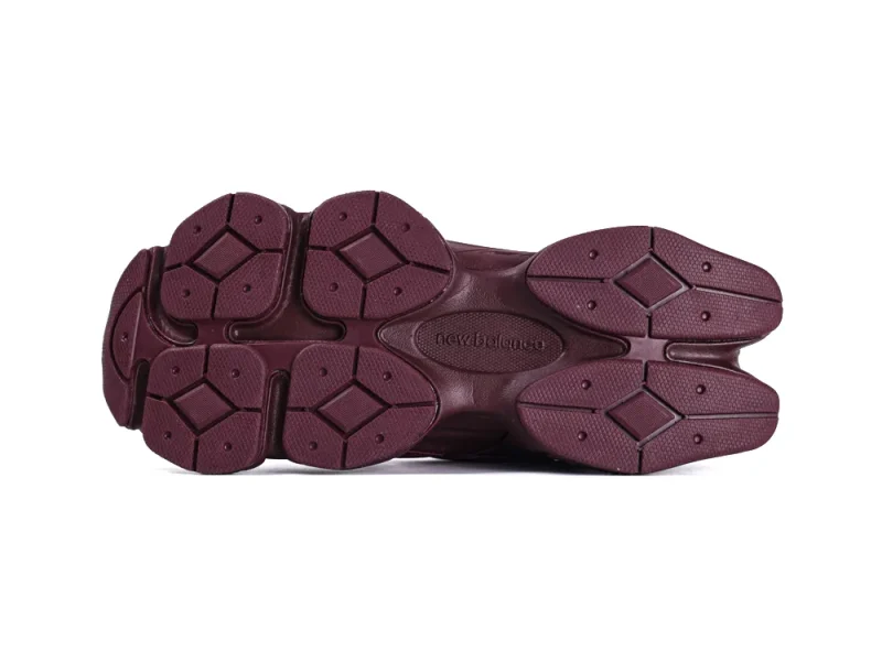 Burgundy rubber sole with textured pattern for grip and durability.
