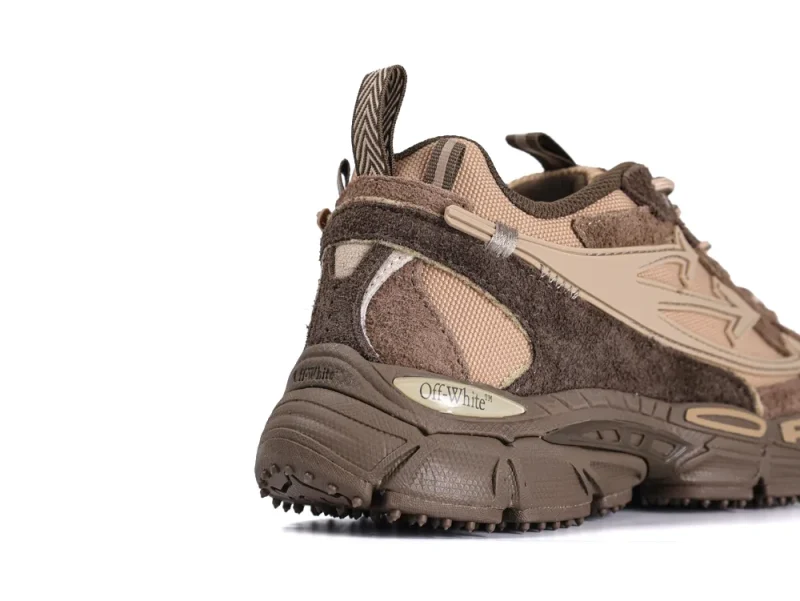 Brown and beige sneaker made of suede and mesh with rubber sole.