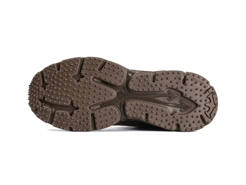 Brown rubber shoe sole with textured pattern for enhanced grip and durability.