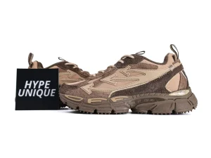 Brown and beige sneakers with mesh and suede materials, featuring chunky rubber soles.