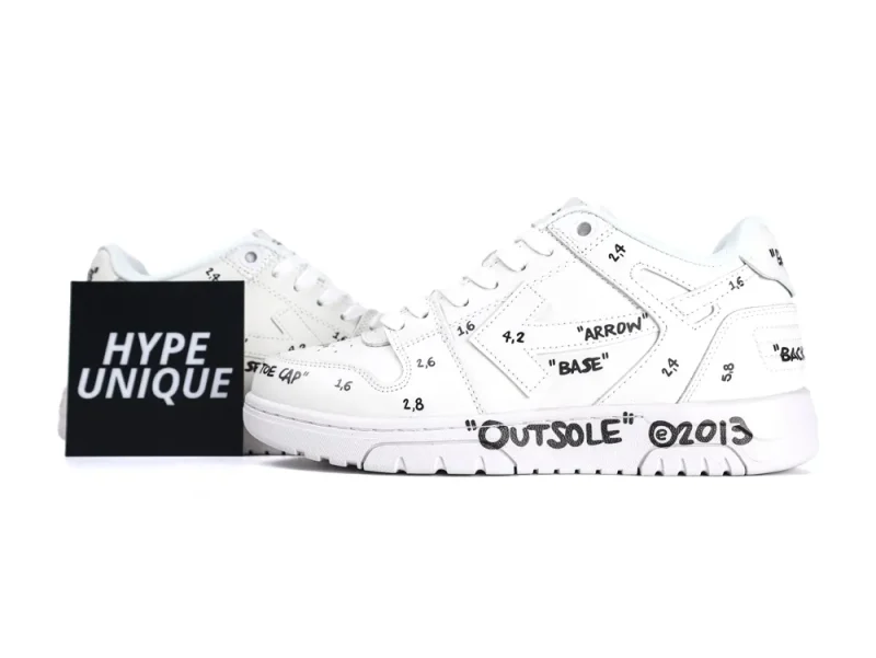 White leather sneakers with black text and numbers on various parts.