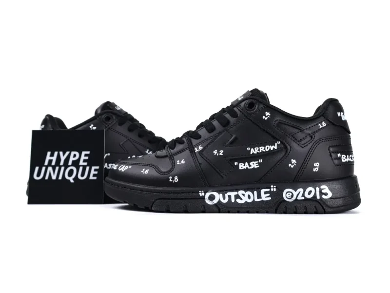Black leather sneakers with white text details on the upper and outsole.