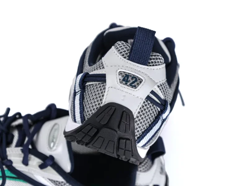 Rear view of Balenciaga Radar Sneaker in grey and navy, showing the "42" size embroidery and textured black outsole.