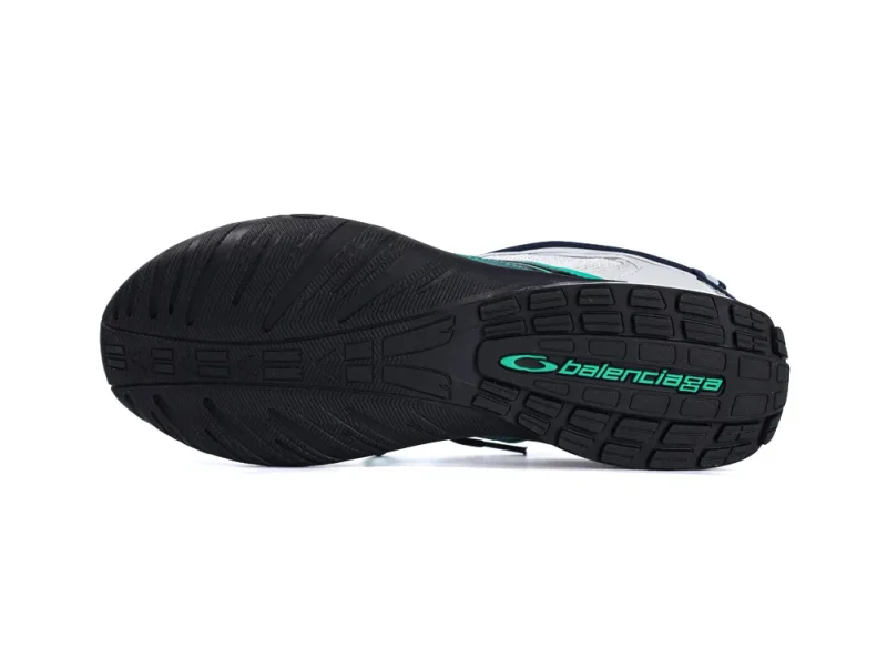 Bottom view of the Balenciaga Radar Sneaker showing the black rubber tread pattern with a green "Balenciaga" logo.