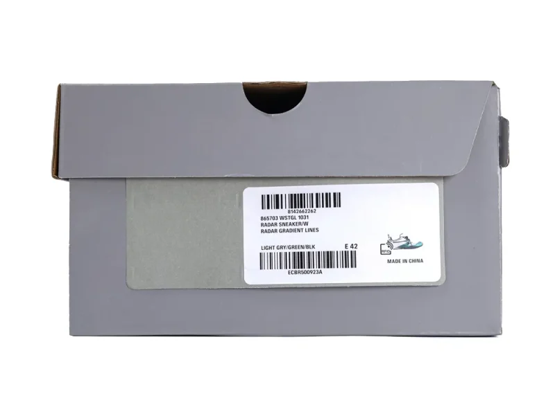 Product label on a grey Balenciaga shoe box featuring SKU 865703 WSTGL 1031 and "Radar Sneaker" description.