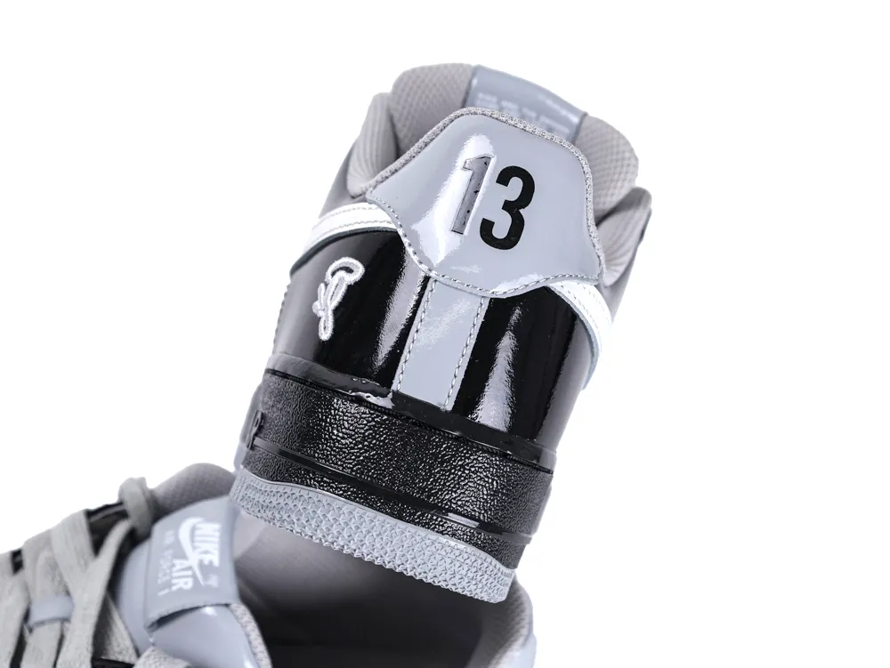Rear view showing the "13" graphic on the grey heel tab and the embroidered logo on the side.