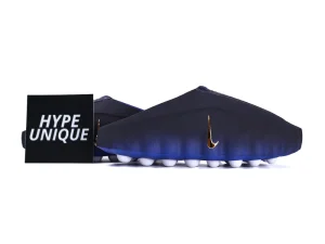 Lateral side view of the Nike Mind 001 Blackened Blue featuring the unique bulbous white traction pods.