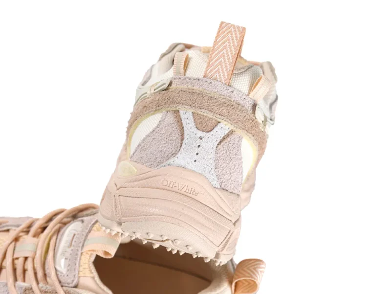 Rear view showing the Off-White embossed logo on the heel and a patterned pull tab.