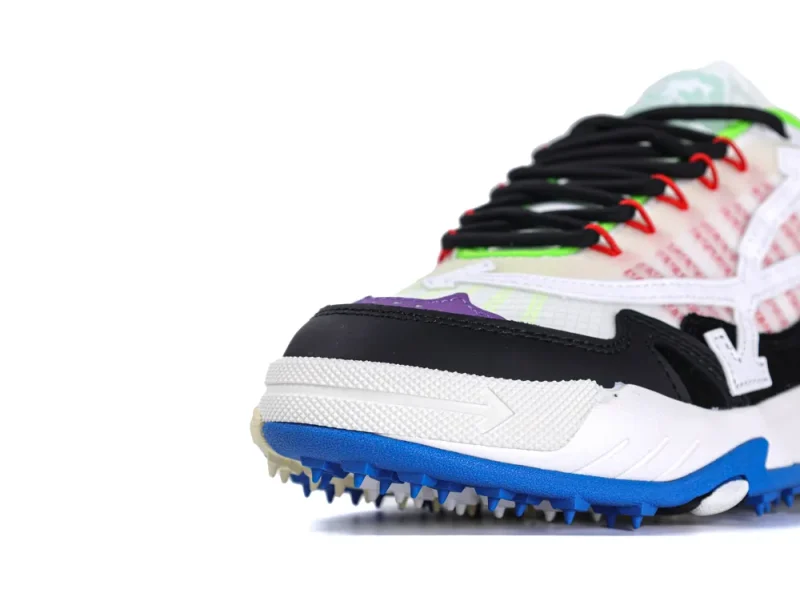Colorful sneaker with black, white, and blue accents; leather and mesh materials.