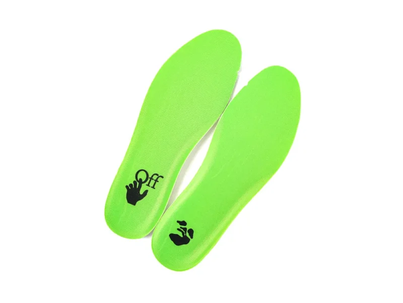 Lime green fabric insoles with black graphics, designed for comfort and support.