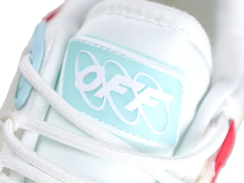Blue Off-White logo patch on white sneaker tongue