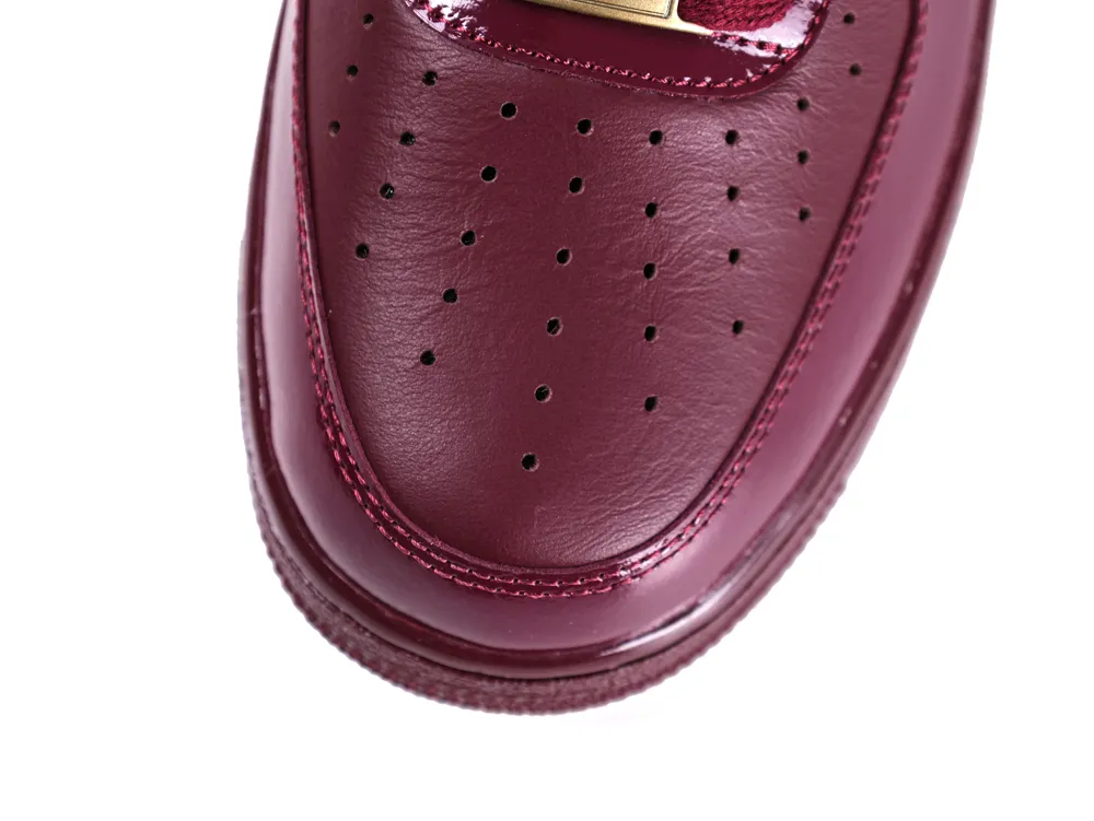 Syna x Air Force 1 '07 Dark Beetroot and Red Oxide perforated toe box detail