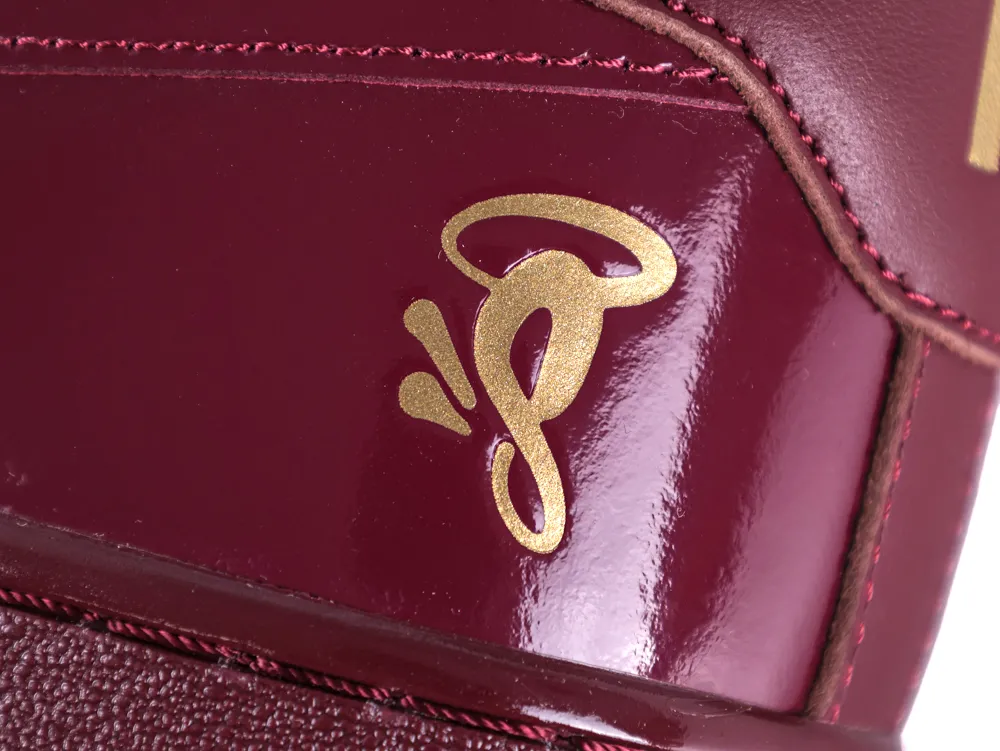Syna x Air Force 1 '07 Dark Beetroot and Red Oxide gold side logo detail