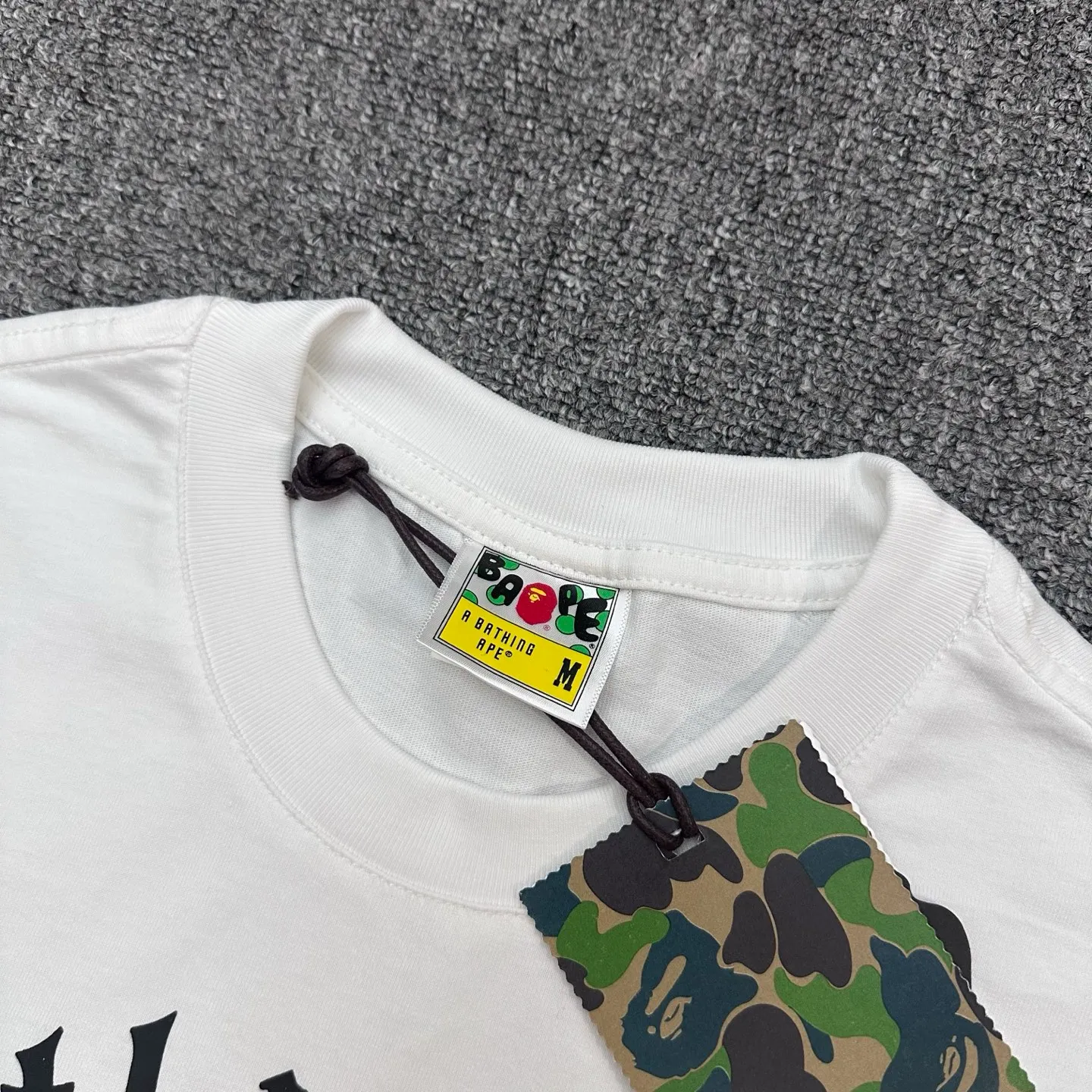 Neckline with visible Brand Tag and Label