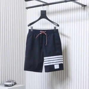 TB Nylon Four-Stripe Drawstring Shorts
