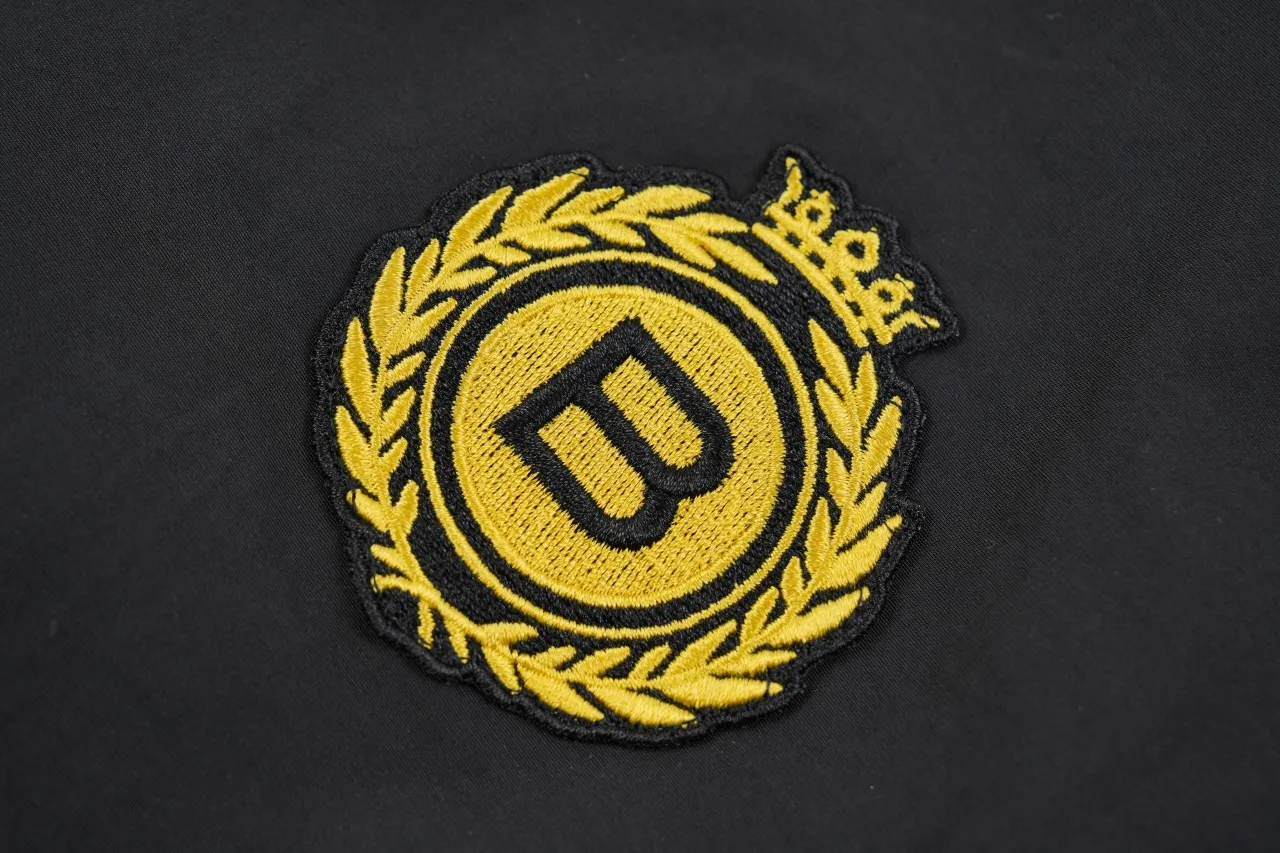 B Logo Detail