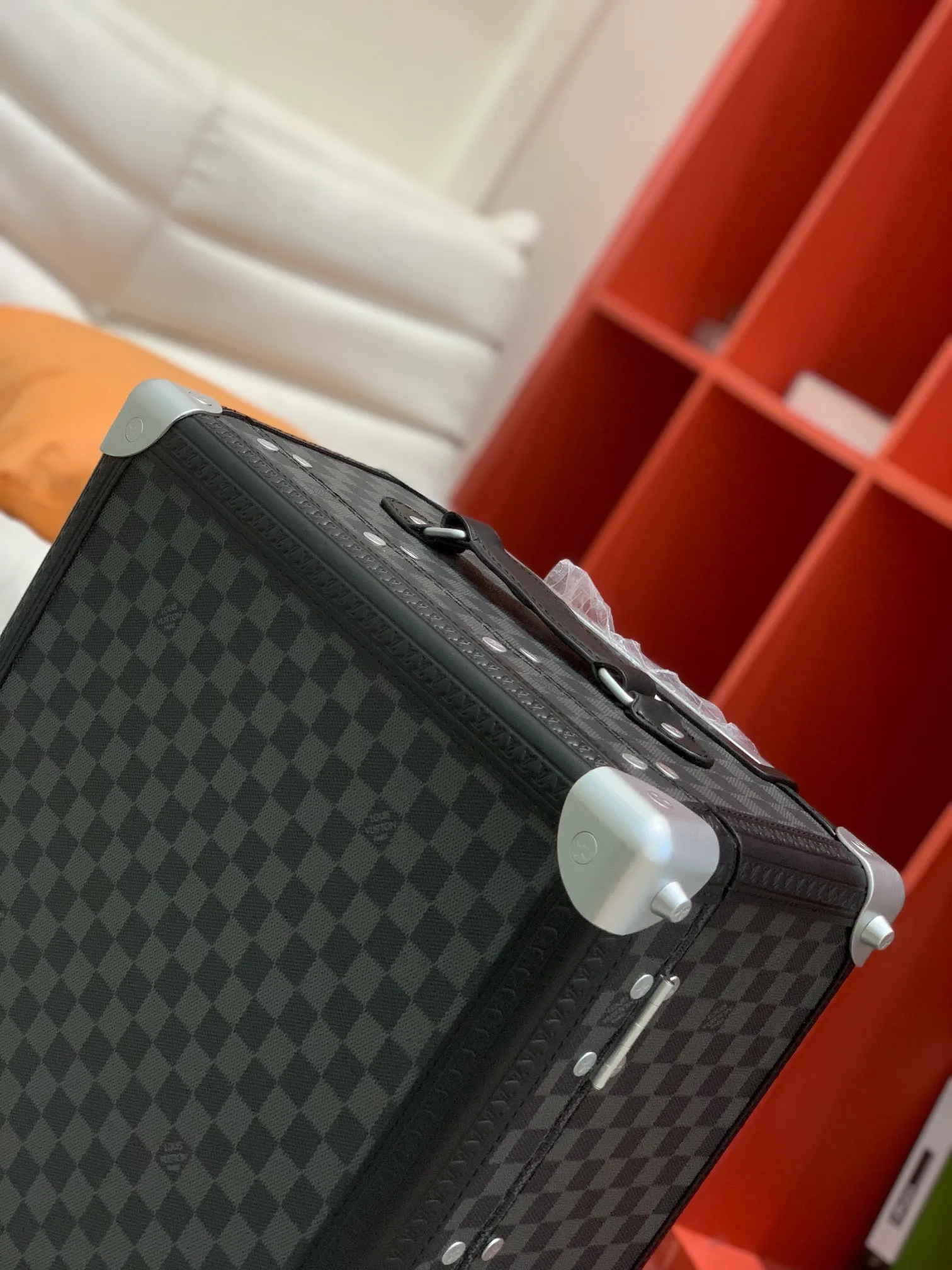 Black Damier Rolling Trunk Suitcase Corner Detail