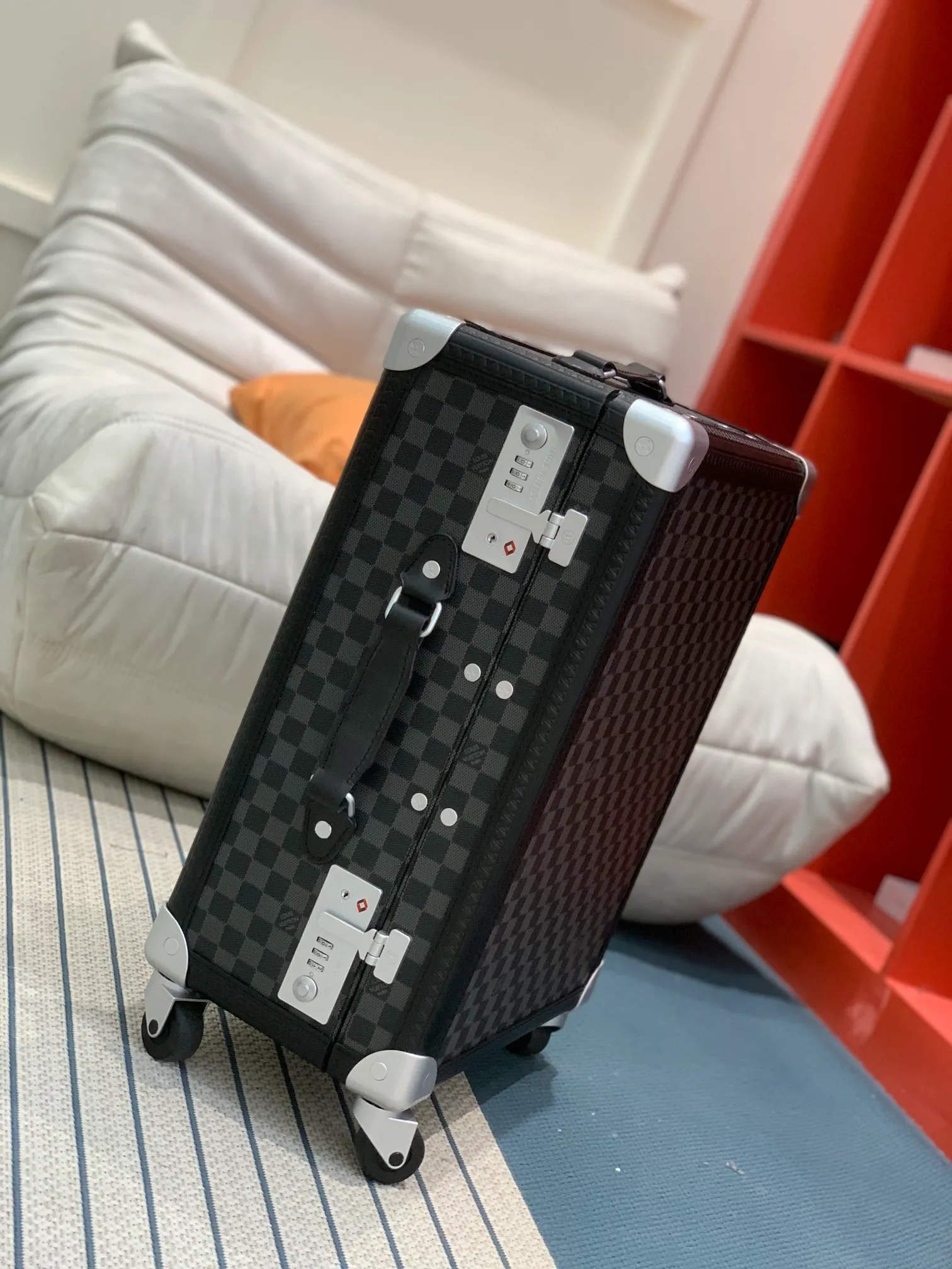Black Damier Rolling Trunk Suitcase Side View With Combination Locks